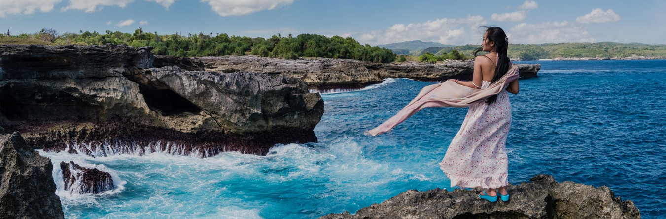 woman looking over the ocean